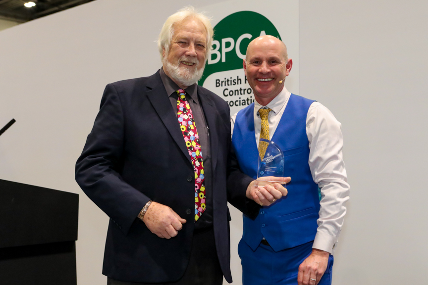 P-2629 Dr Jonathan Wade (left) being presented his Lifetime achievement award by television ecologist Mike Dilger (right)